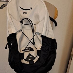 The North Face Black and Cream Athletic Backpack